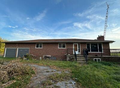 102 ac Farm Lands with 2 houses, a building and 10,000 sf greenhouse