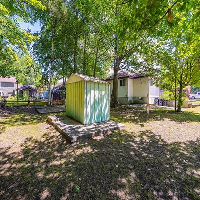 Commercial store with residential unit and vacant land