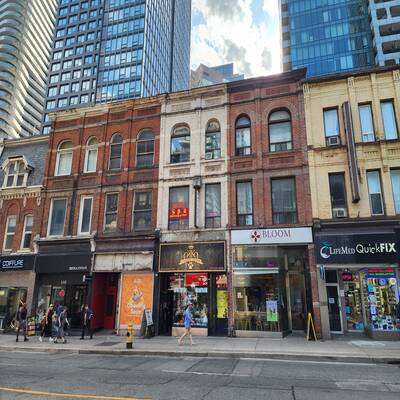 A well-maintained commercial/residential building on Prime Yonge St