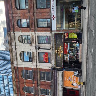 A well-maintained commercial/residential building on Prime Yonge St