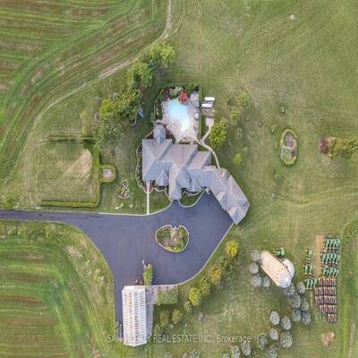 87-acre estate in Rural Burlington land is flat, mostly cleared, and highly functional